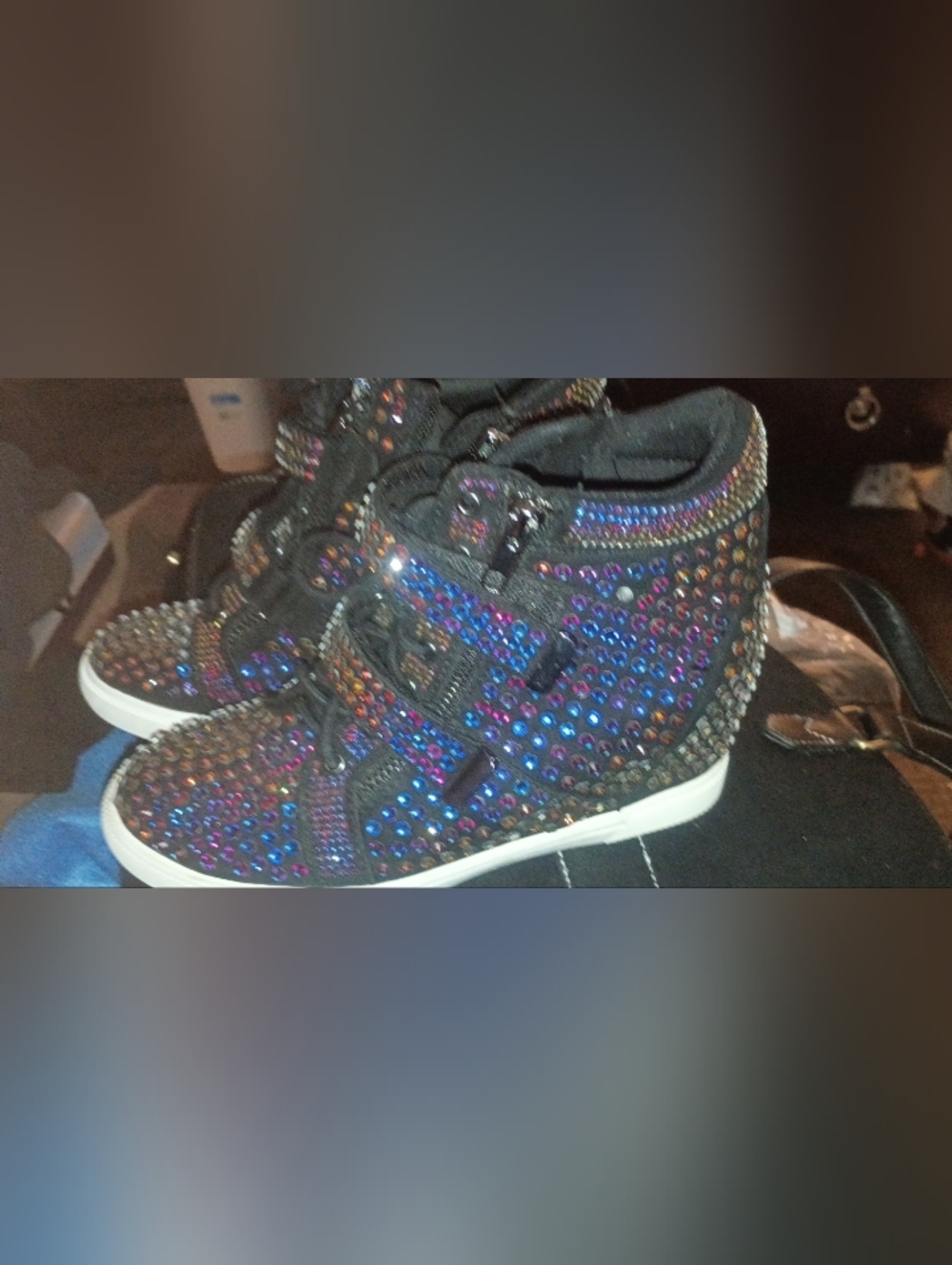These high-top wedge sneakers, heavily embellished with multi-colored rhinestone